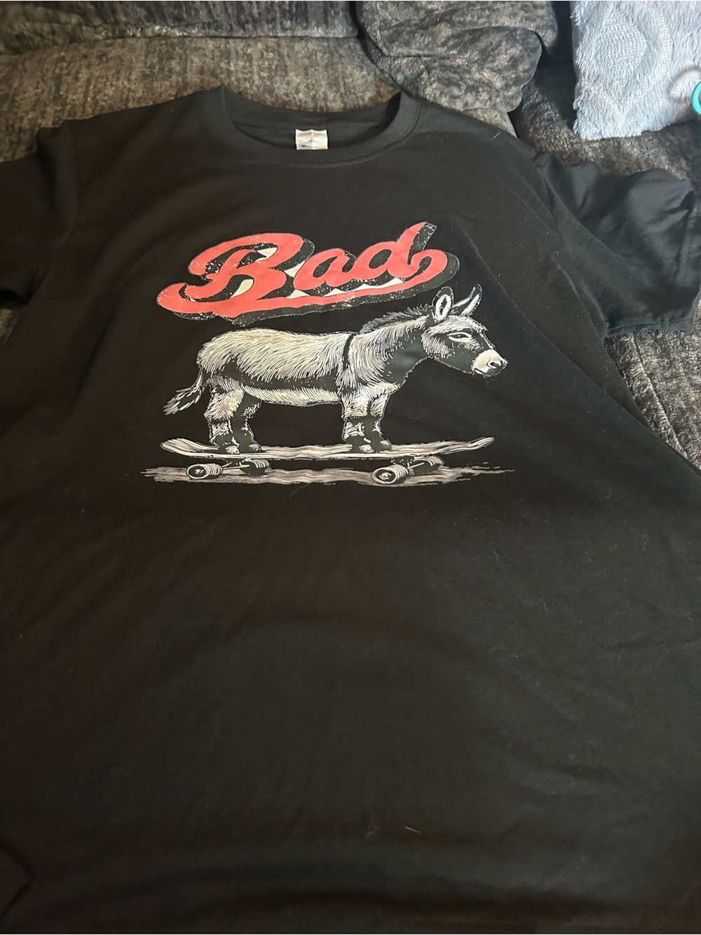 Haloo Black Graphic Tee with Red "Bad" Script and White Donkey Skateboard NWOT